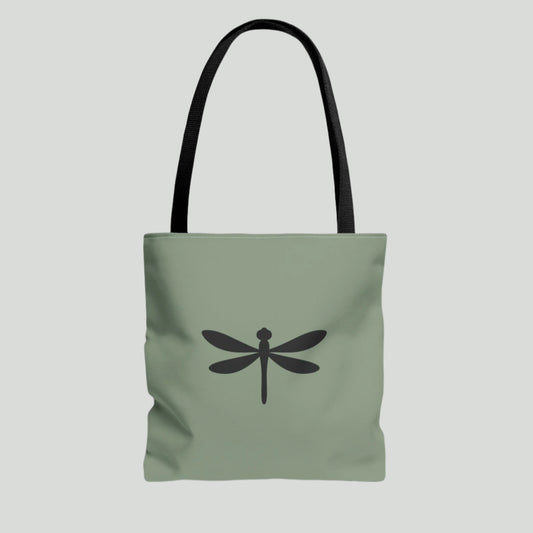 Green tote bag with a black dragonfly design on a white background