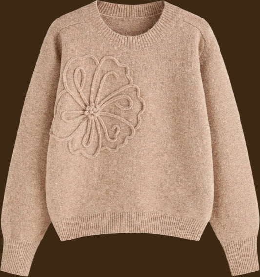 Beige sweater with a floral design on a white background