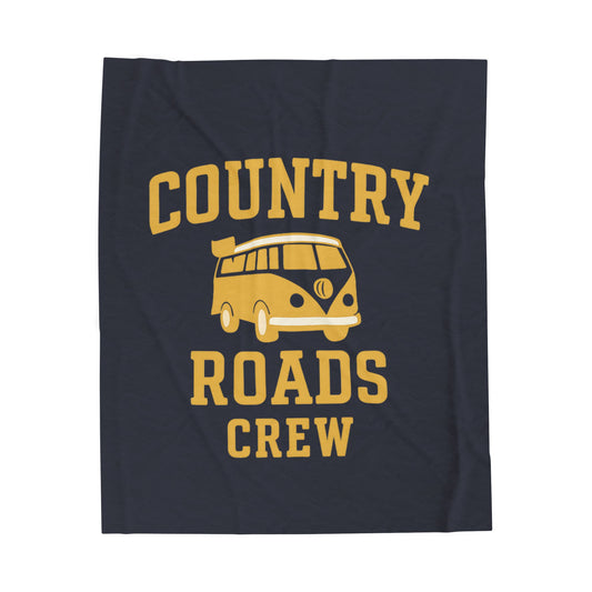 Navy blanket with yellow 'Country Roads Crew' text and van graphic on a white background