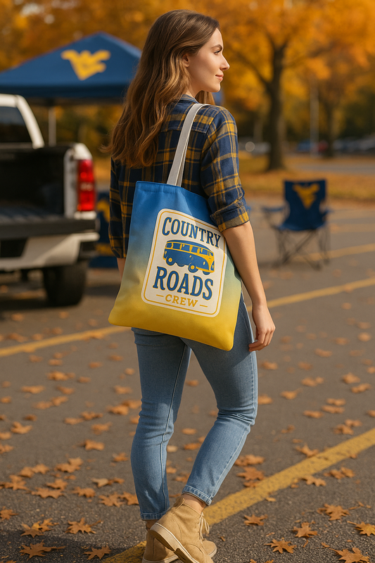 Woman walking with a 'Country Roads Crew' tote bag in an outdoor setting with fall foliage.