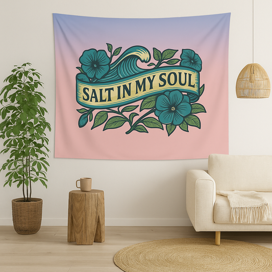 Tapestry with 'Salt in My Soul' design hanging on a wall above a sofa.