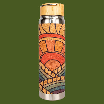 Metal water bottle with cork sleeve and bamboo cap on a white background